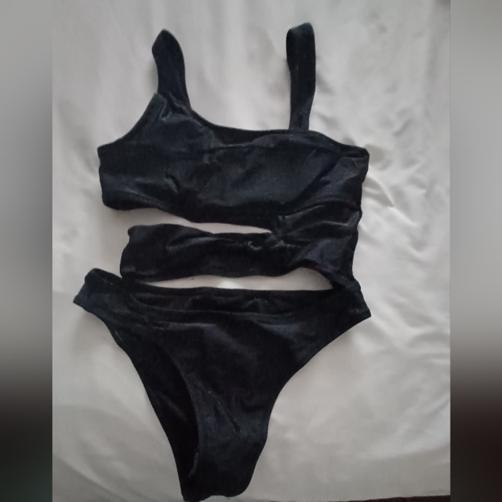 One piece black bathing suit, brand new, never worn
